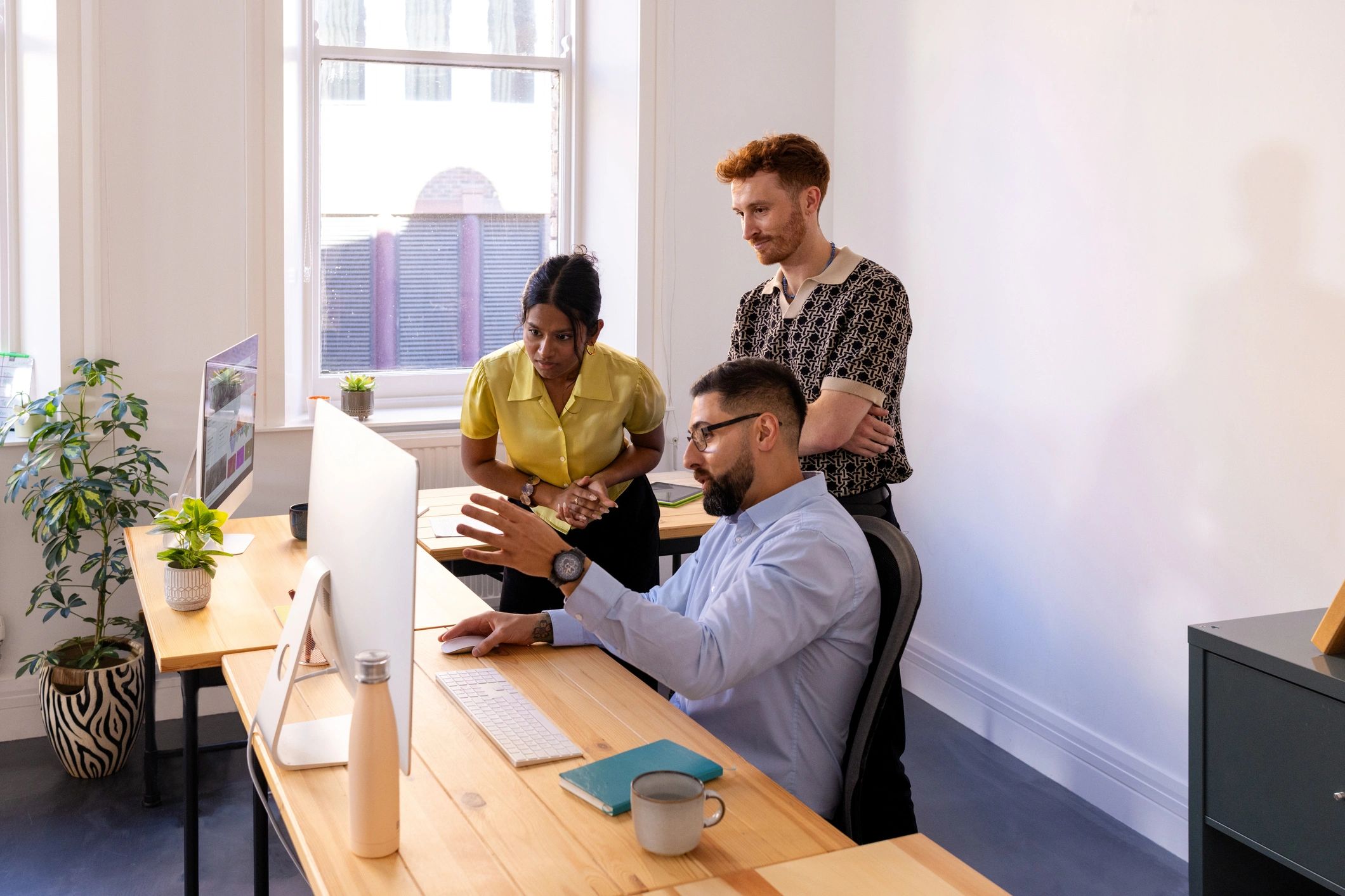 Deepsoft AI team reviewing work together