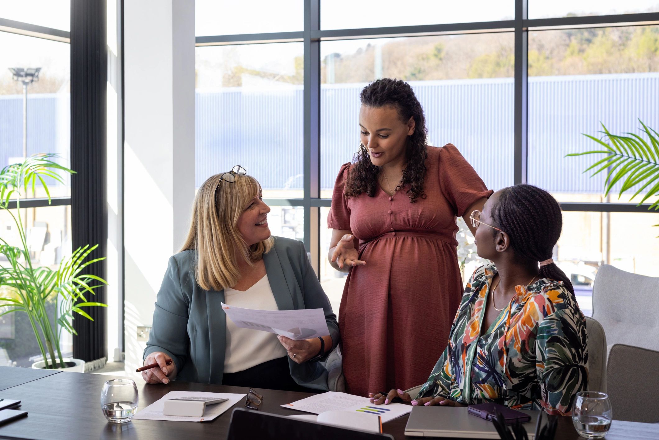 Young professionals collaborating around a table
