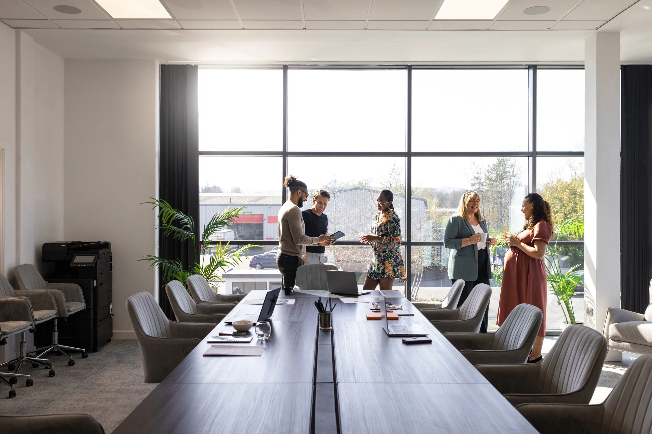 Enterprise team discussing AI automation strategy in a modern meeting room