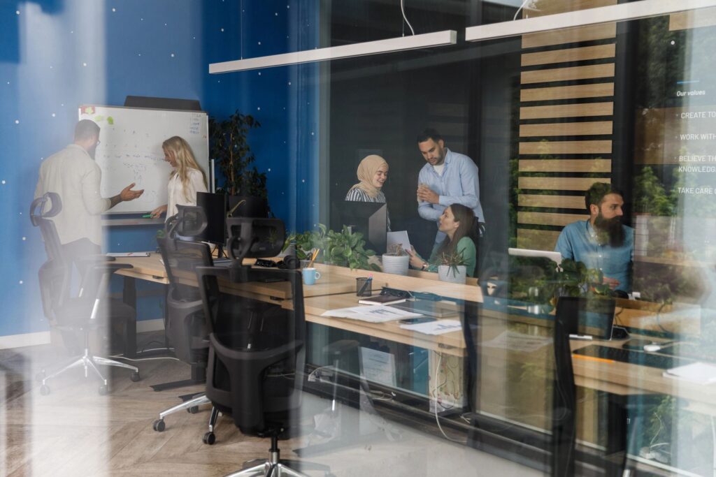 Selective focus shot of business people co-working together in a modern office space